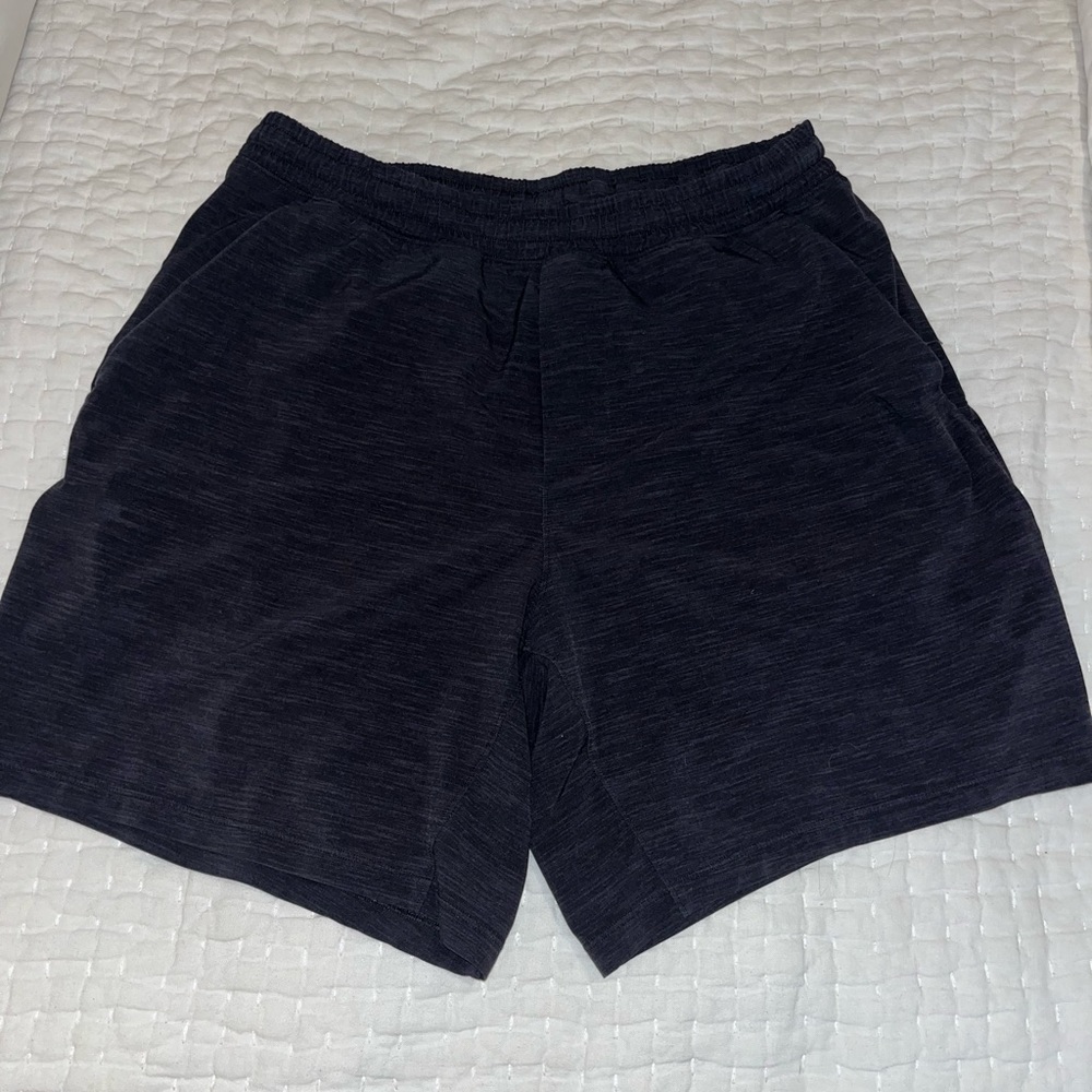 Pacebreaker 7” unlined mens shorts. Heathered black